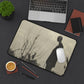 The Silent Watcher Desk Mat